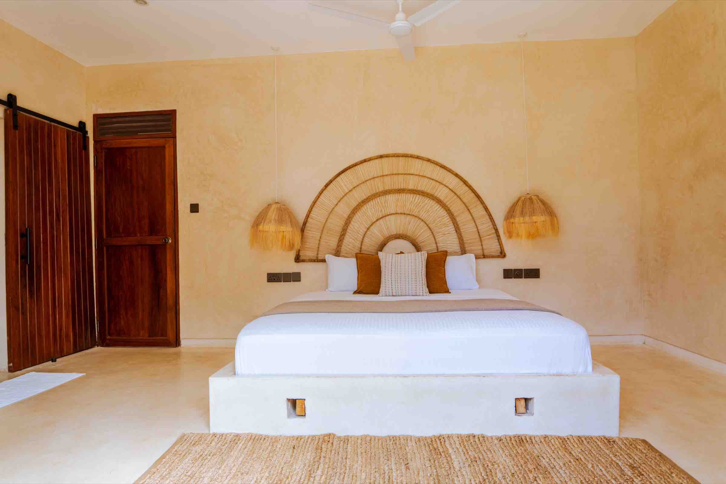 Lamu Suite — barn door to ensuite