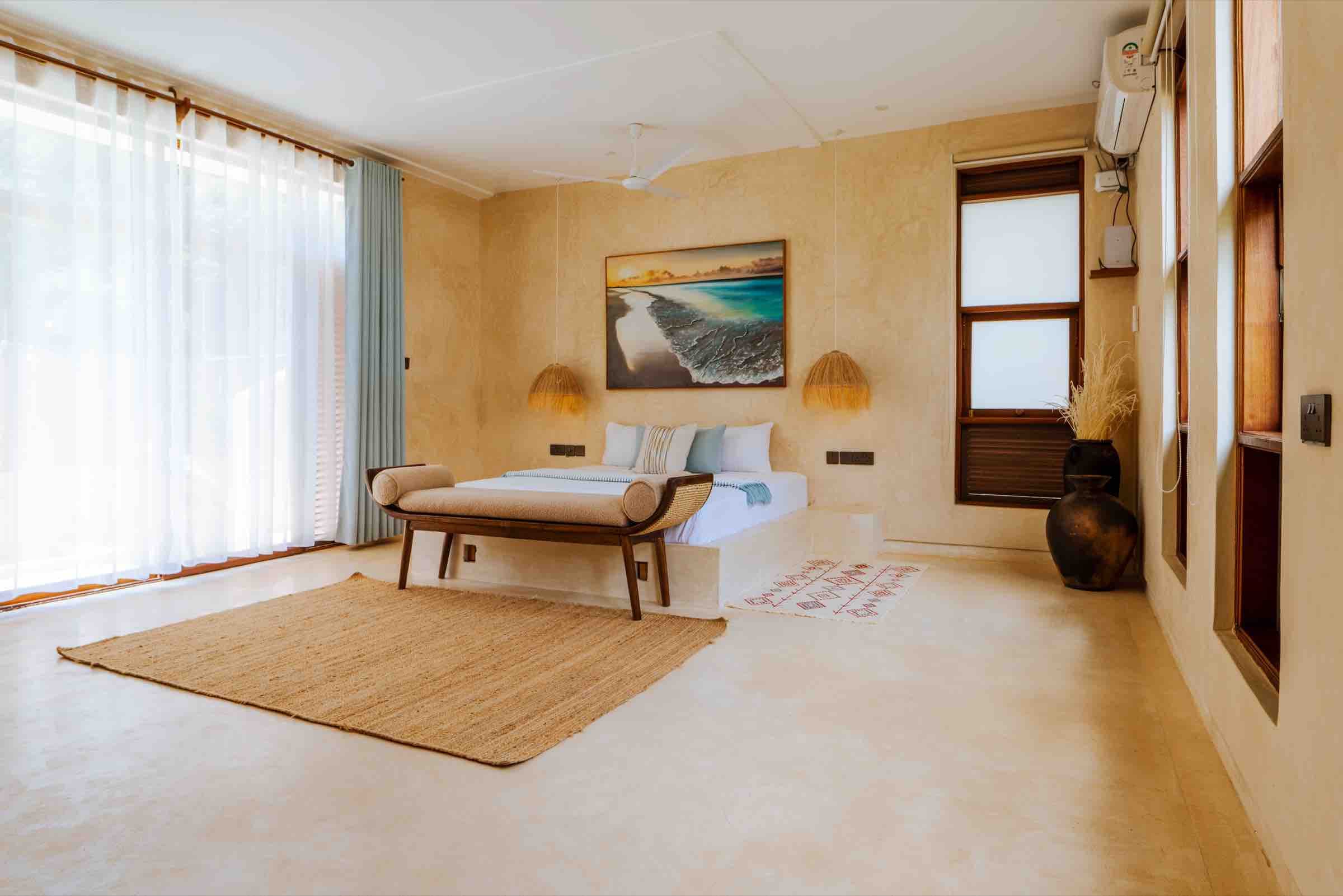 Garden room — king bed, daybed and Diani beach artwork