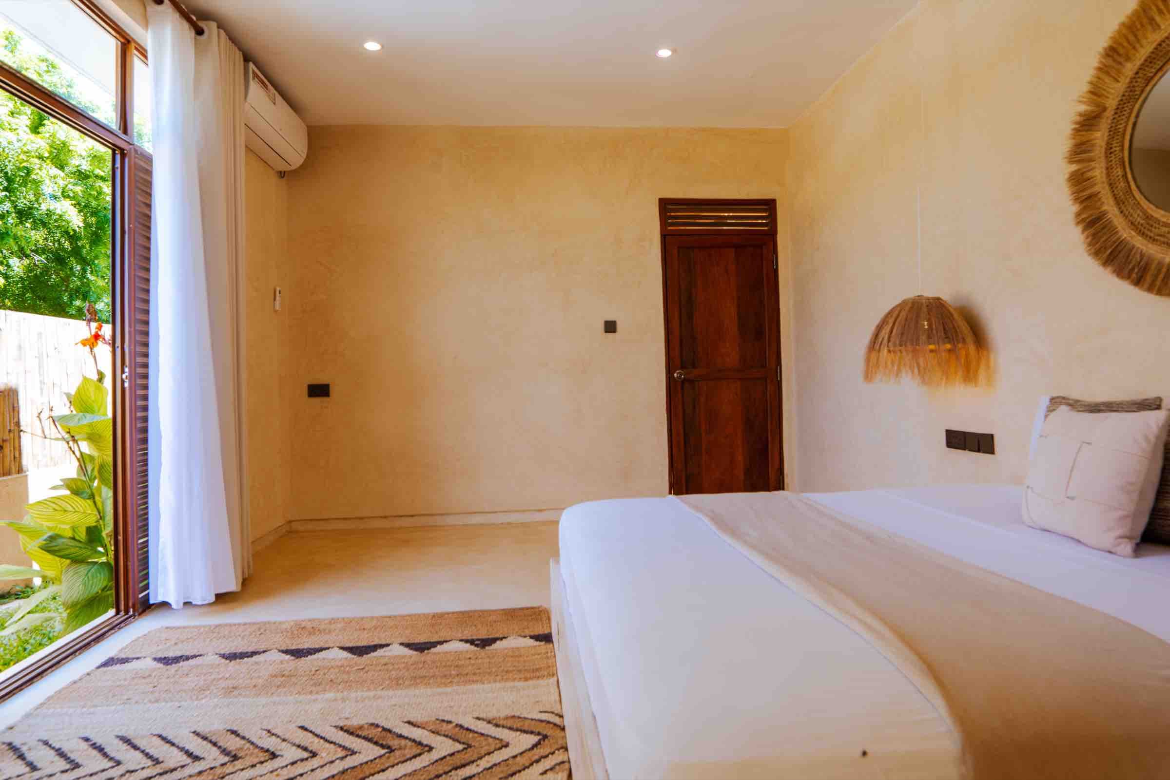 Coral room with garden door open