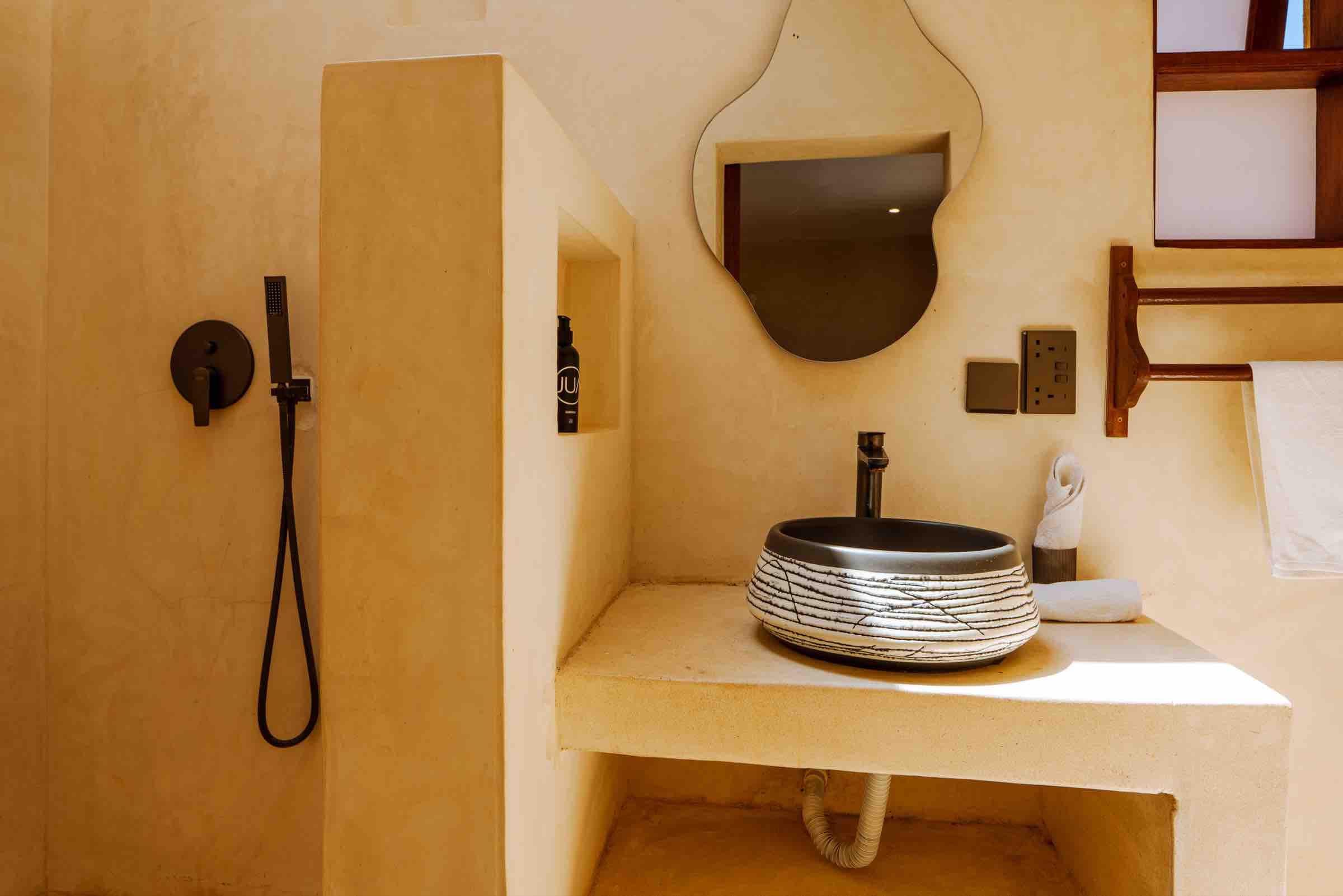 Ensuite with ceramic basin and shower